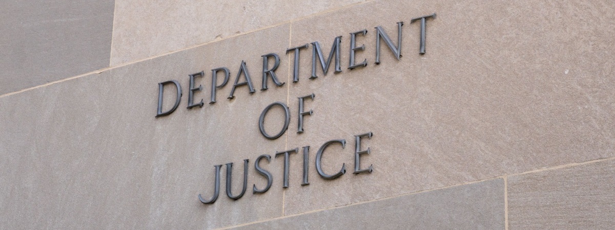 Sign at the United States Department of Justice DOJ in Washington, DC-Shutterstock_2262073553